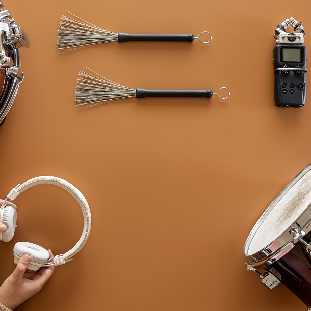 Musical background with musical instruments, flat lay, music creation concept.